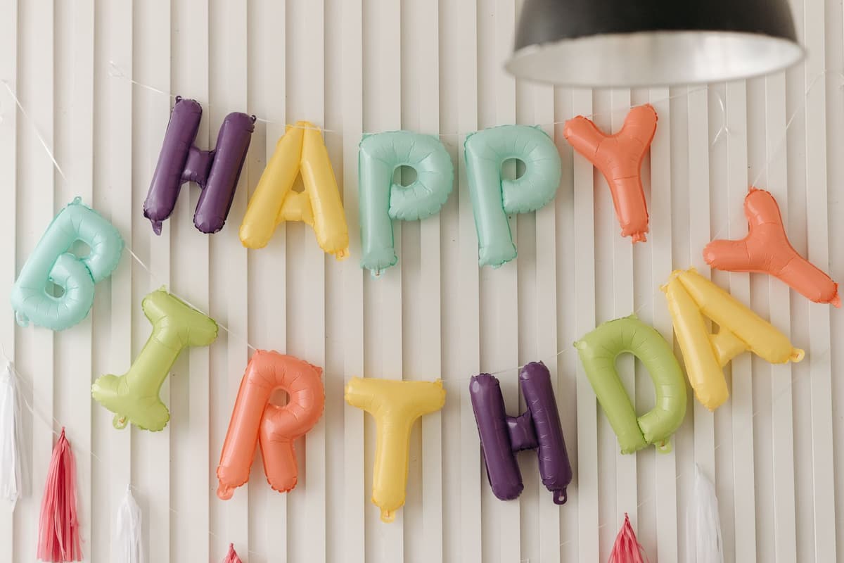 Vibrant balloons spelling 'Happy Birthday' add joy to any party setting